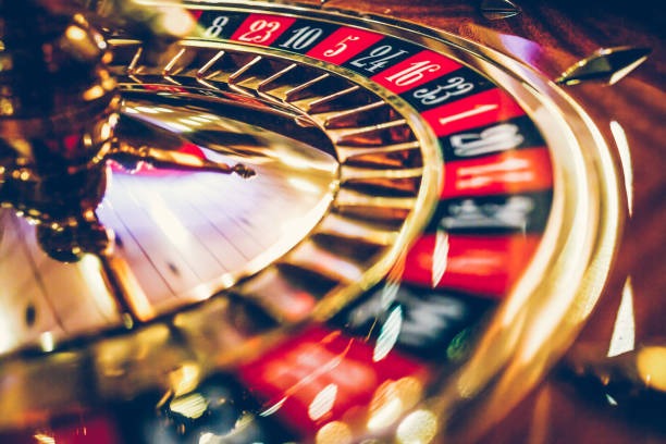 Blueprint Gaming baccarat table with multilingual dealer