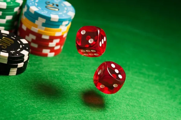 Baccarat table with banker and player hands